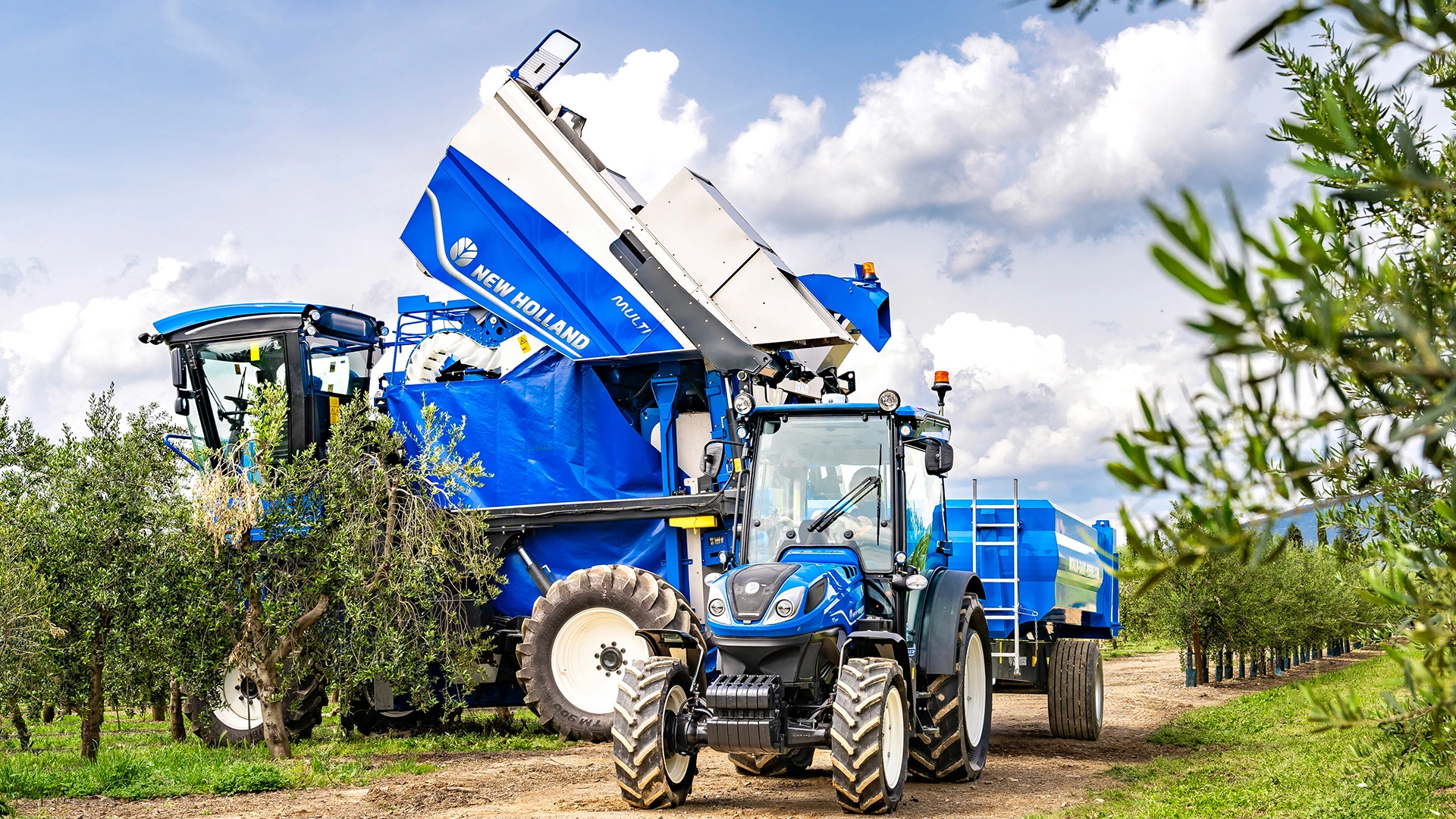 Farming tractor New Holland T4 FNV tending to field tasks