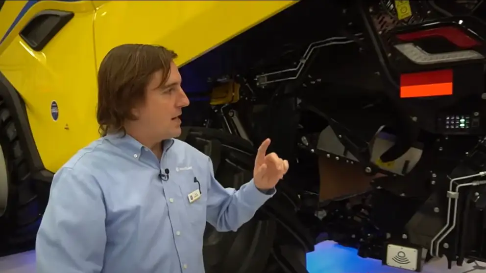 Man shows off features of new CR11 combine from New Holland 