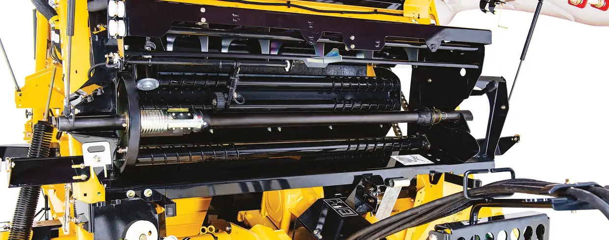 Roll-Belt round baler wrapping system