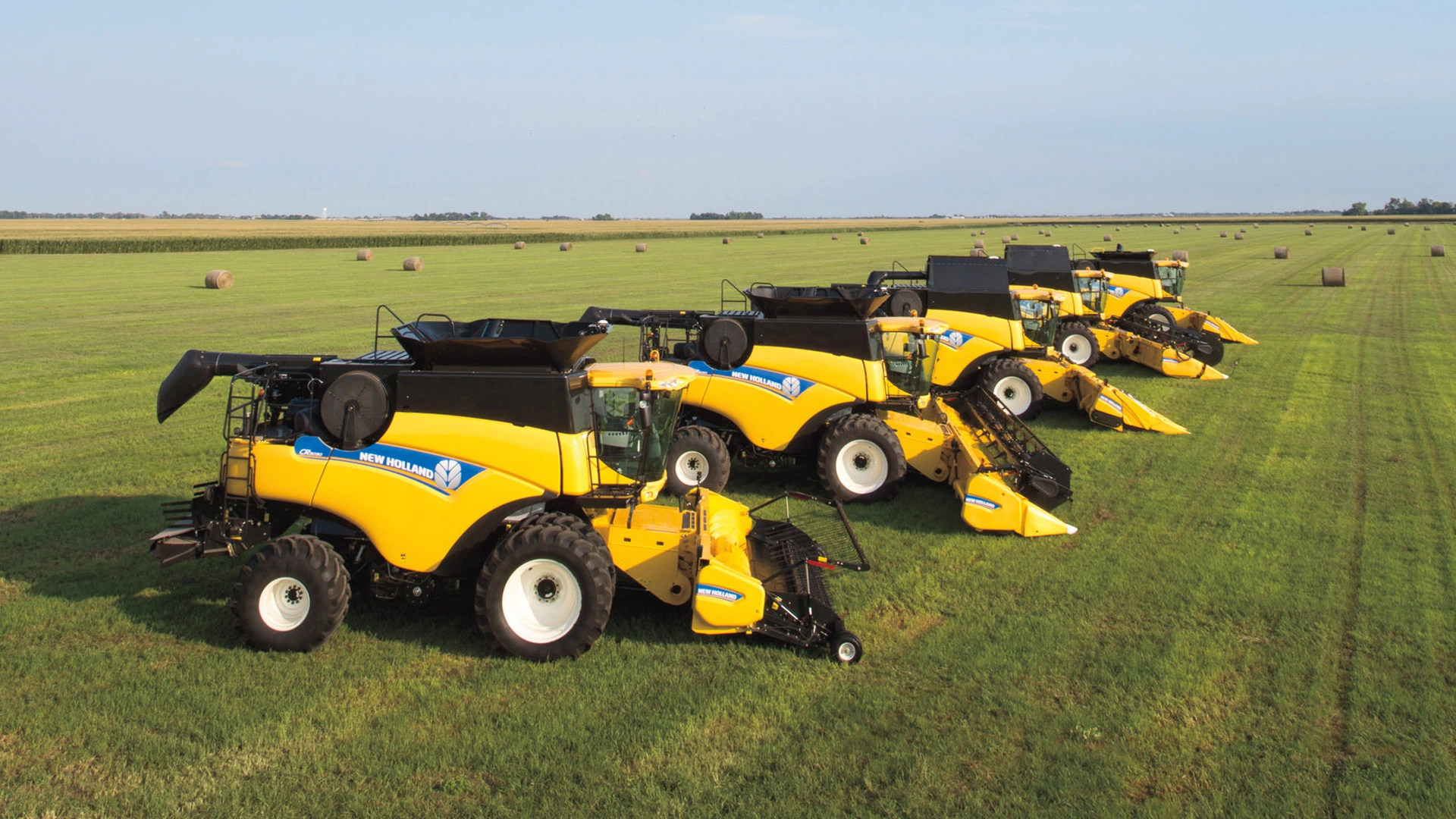 Fleet of New Holland combines with Advanced Pick-Up Corn Header, enhancing productivity on the agricultural field