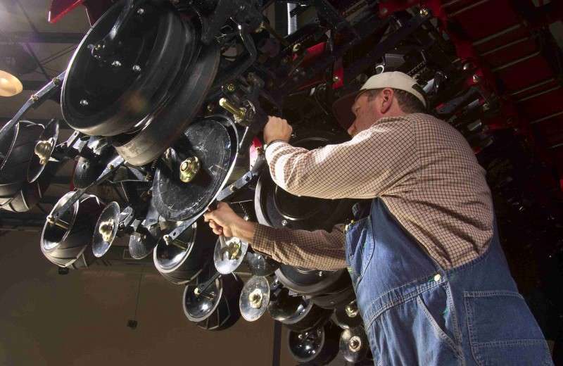 Case IH technician winterizing Early Riser Planter