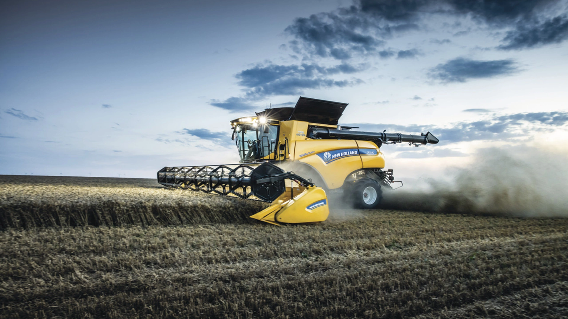 Field scene depicting New Holland's CR Revelation combine utilising its header for optimal crop collection