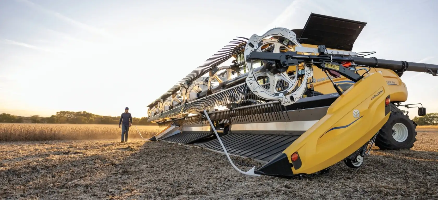 New Holland Twin Rotor® combine with MacDon FlexDraper® Header