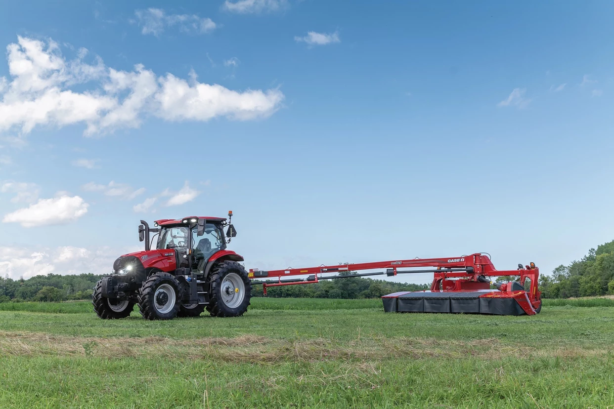 DC165 Mower Conditioner and Maxxum 150 Tractor with blue sky