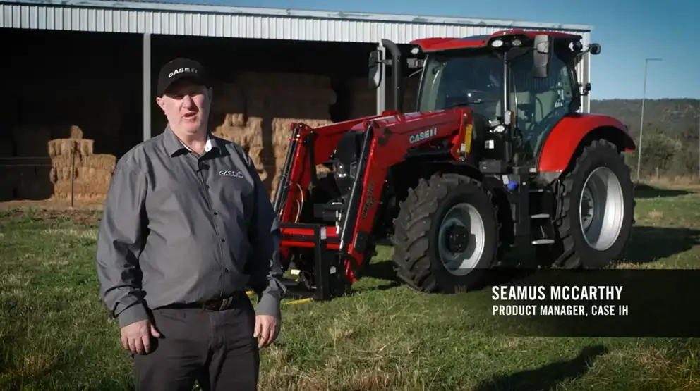 Red Case IH Maxxum 135 tractor with product manager Seamus 