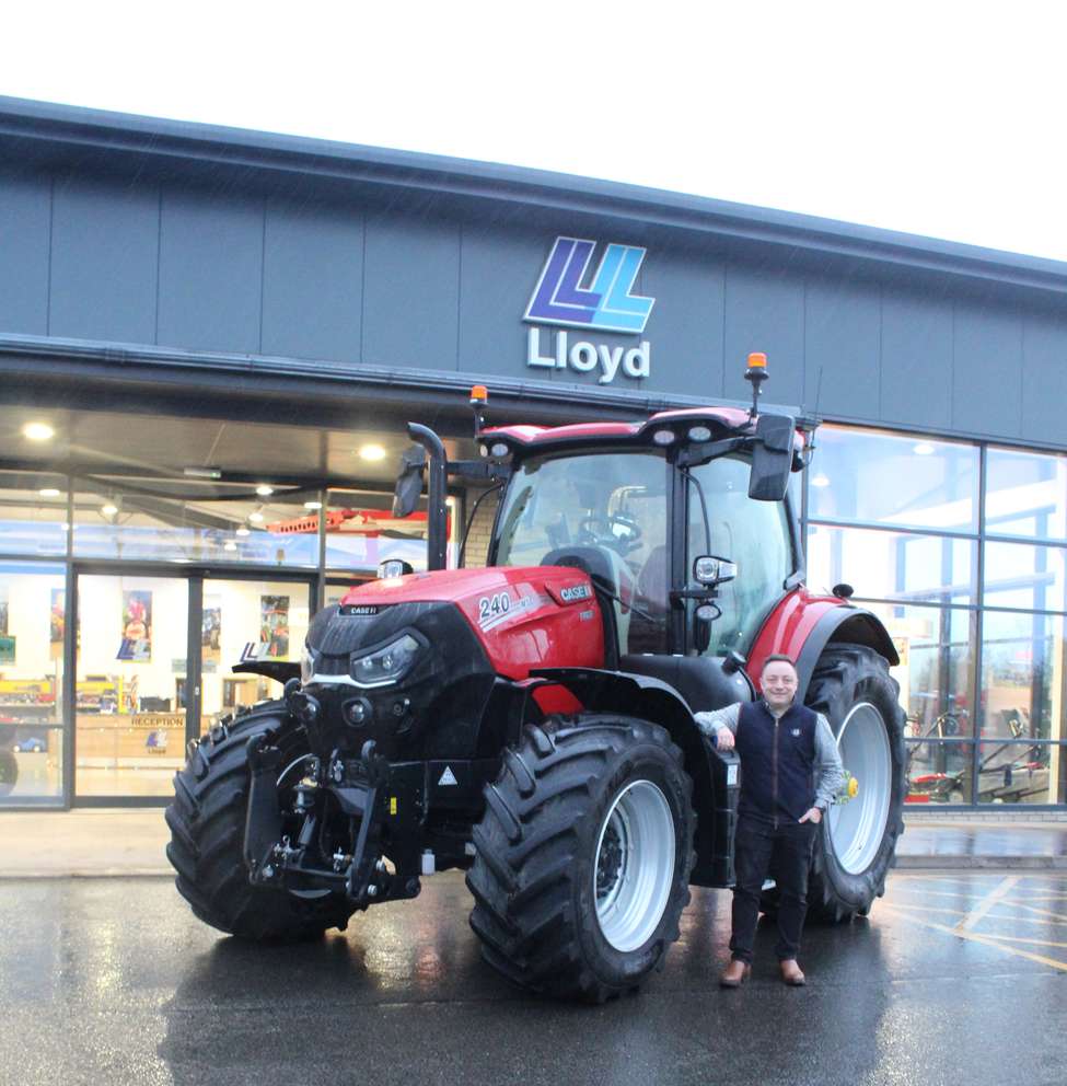 George Lloyd with Case IH tractor.JPG