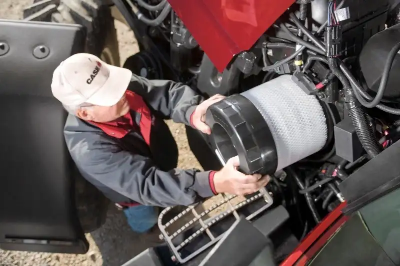 Case IH Technician replacing filter