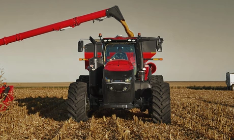 Magnum 250 tractor with grain auger