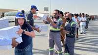 New Holland Middle East and Africa team distributes 500 meal packs to people in labor camps