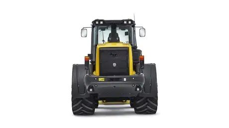studio photo of the New Holland W110D wheel loader.
