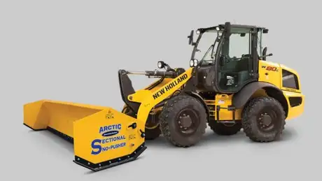 New Holland Construction W80C with Artic Sectional Sno-Pusher.