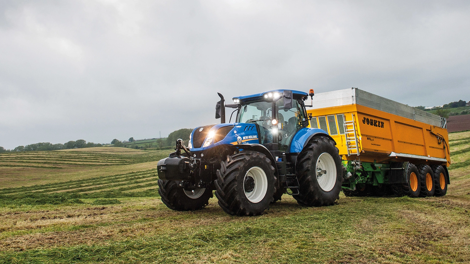 T7 LWB Farming Tractor transporting good
