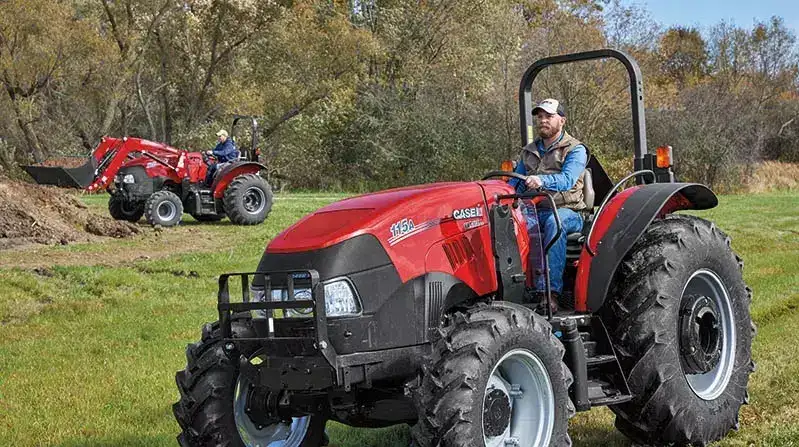 Farmall Utility 115A and 105A in a field
