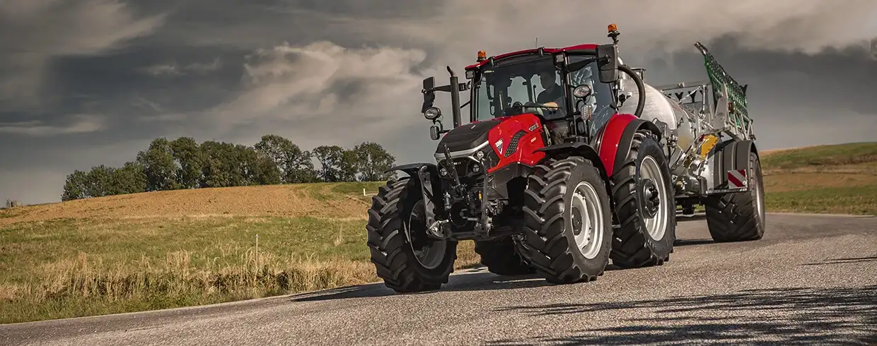 Red Case IH Farmall C MY25 tractor working in field