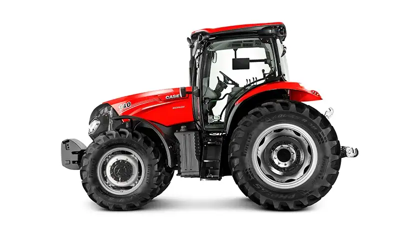 Vista lateral de um trator Farmall Max, exibindo um design robusto que concretiza a potência nas operações no campo.