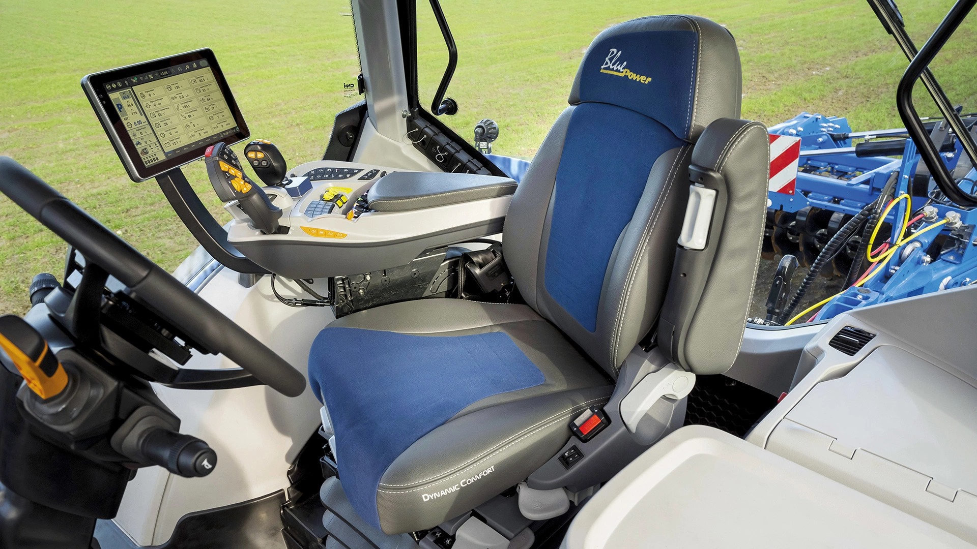 Detailed view of the inside of T7 Heavy Duty With PLM Intelligence agricultural tractor's cockpit