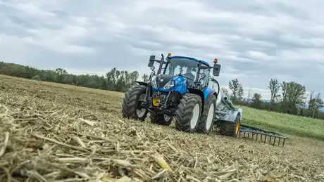 New Holland T5 Dual Command tractor working in field