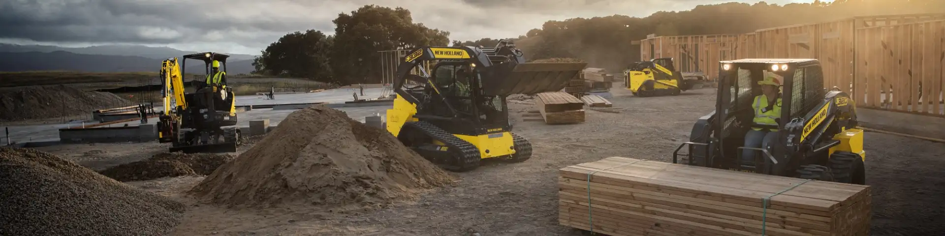 Fleet of New Holland Construction equipment on a jobsite