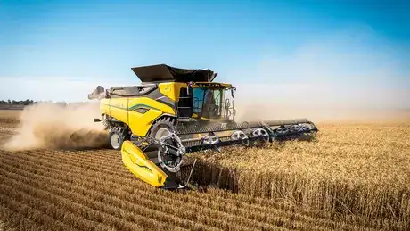 New Holland CR10 combine working in field in Dalby, Queensland