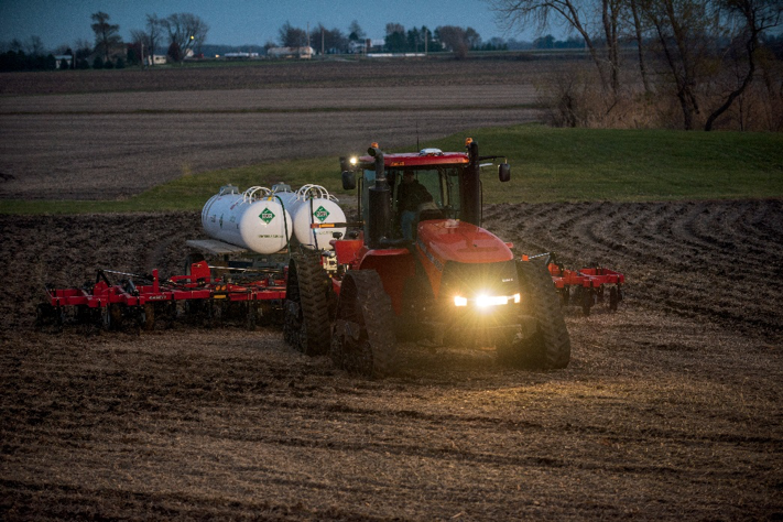 Steiger at night pulling Nutri-Placer