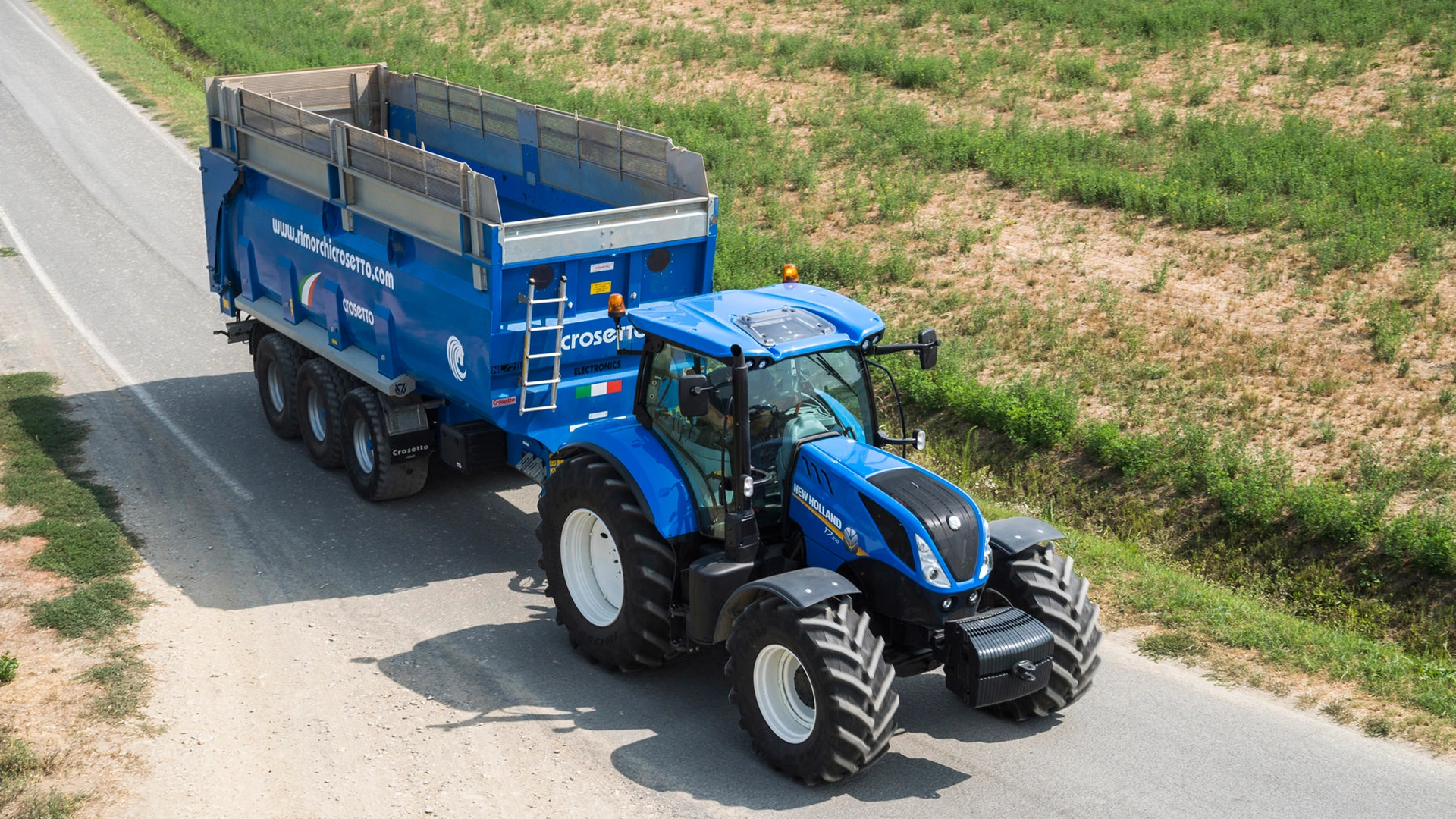 T7 LWB Farming Tractor transporting goods