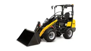 Small articulated loader from side.
