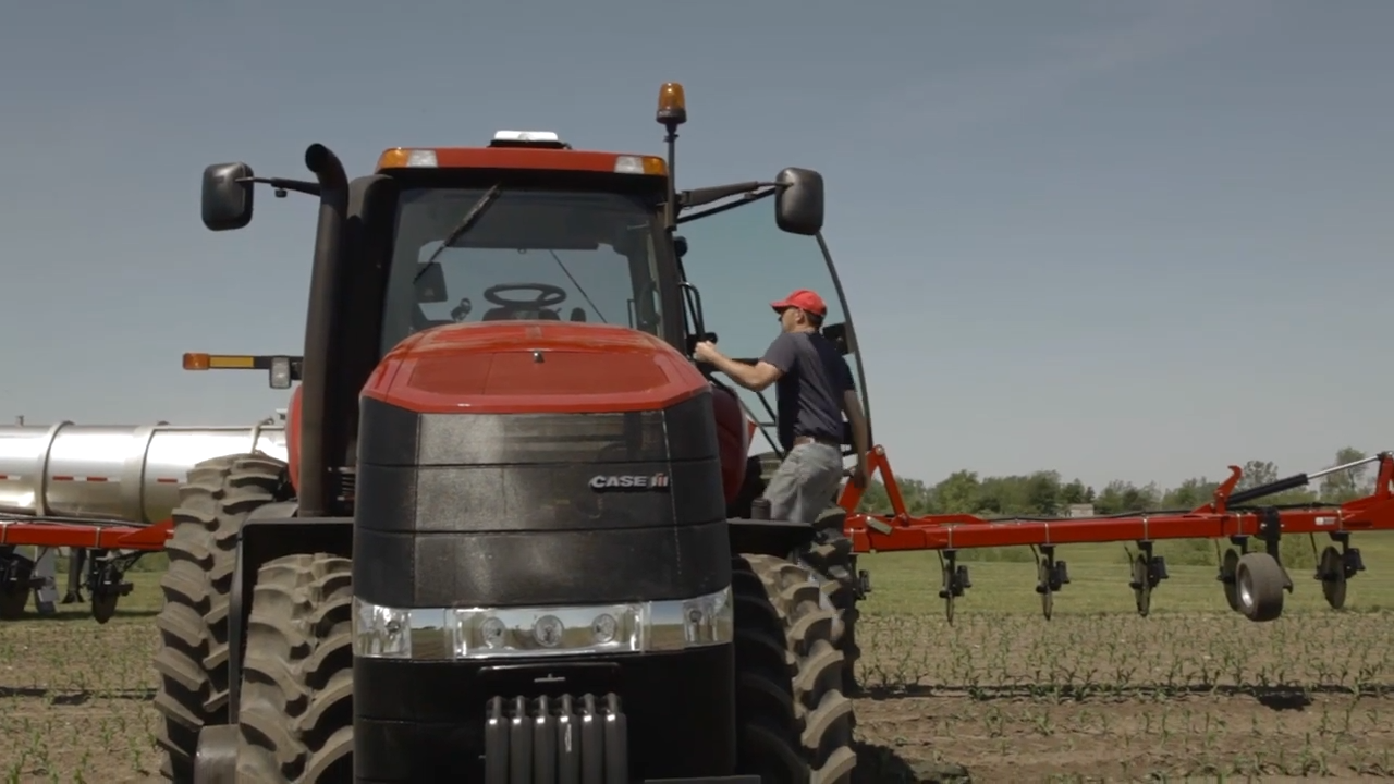 Producer Climbing into Case IH Magnum tractor