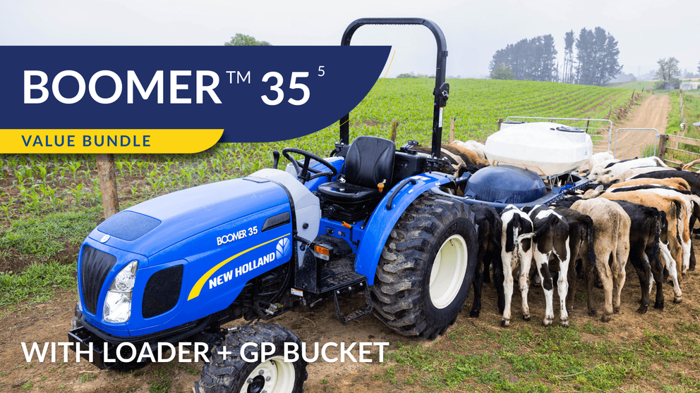 New Holland Boomer 35 tractor sitting in field with operator