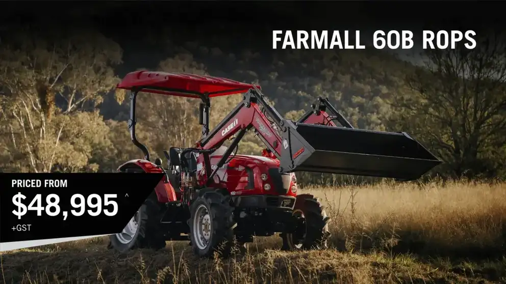 Red Case IH Farmall B tractor working in field 
