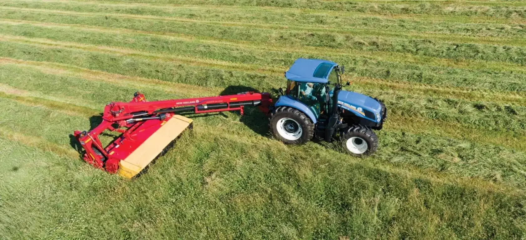 PowerStar Tractor pulls a disc mower-conditioner 