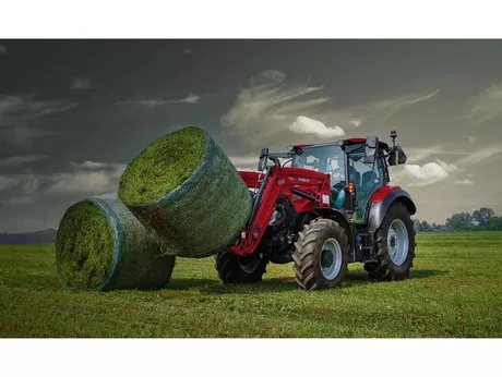 Vestrum 130 with loader in a field.