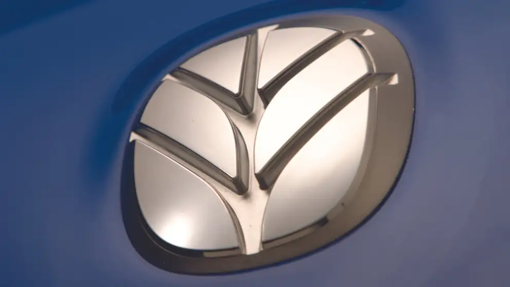 New Holland emblem leaf logo