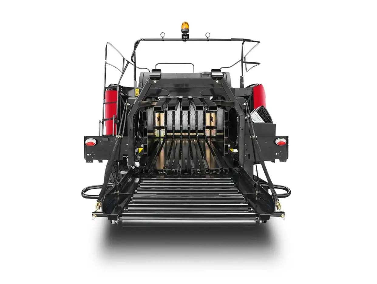 Rear view of the Case IH LB4 Series large square baler showing the bale chamber and discharge conveyor on white background