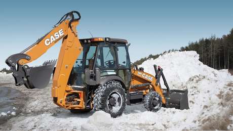 CASE Backhoe Loader working in snow