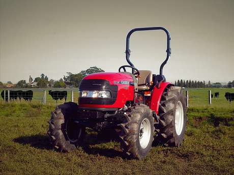 Red Case IH Farmall 50B tractor in field