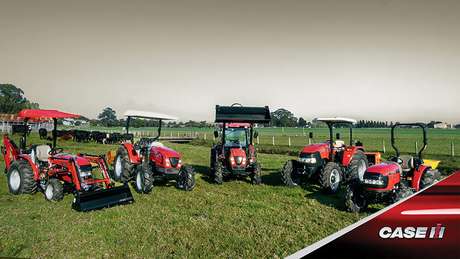 Case IH tractors sitting in field in line up of equipment