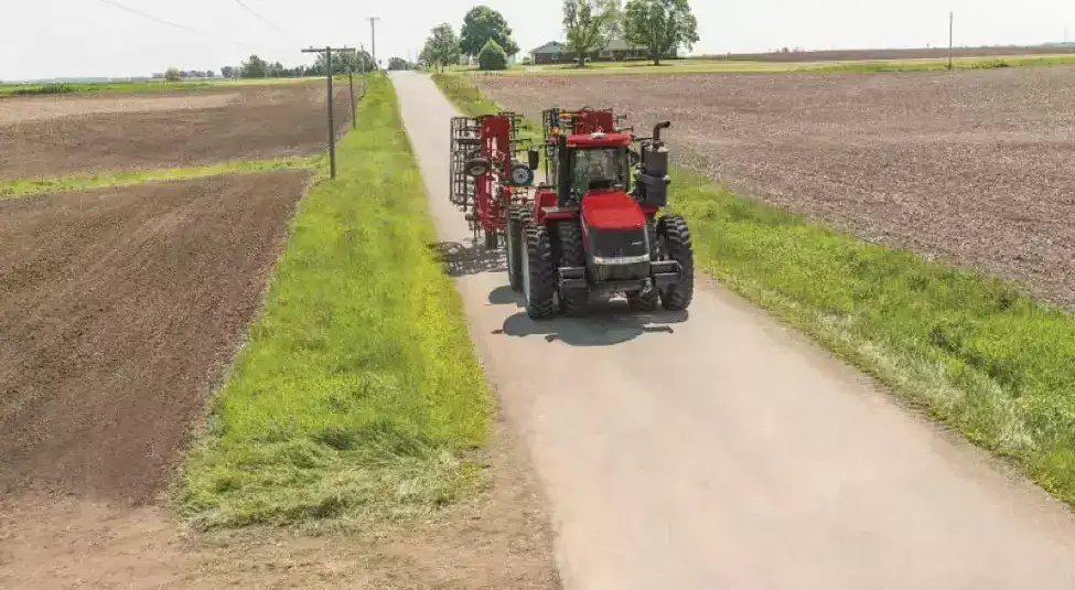 Steiger tractor with Tiger-mate on road