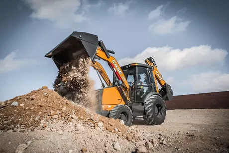 580 Super N WT Construction King™ Backhoe Loader action shot