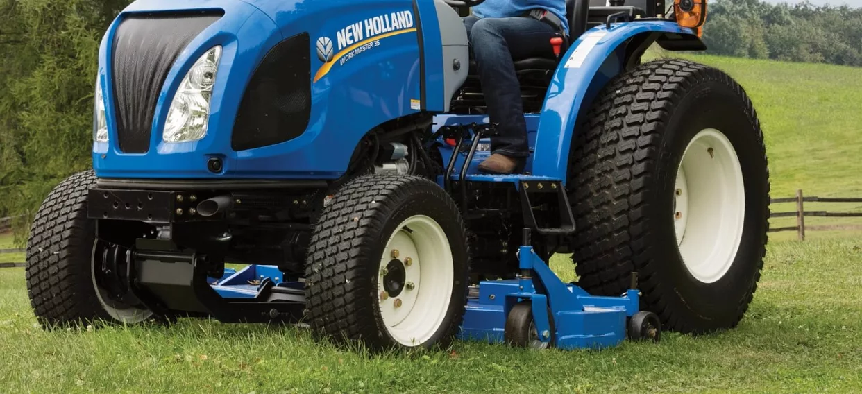 Mid-mount finish mower on a WORKMASTER 25 tractor