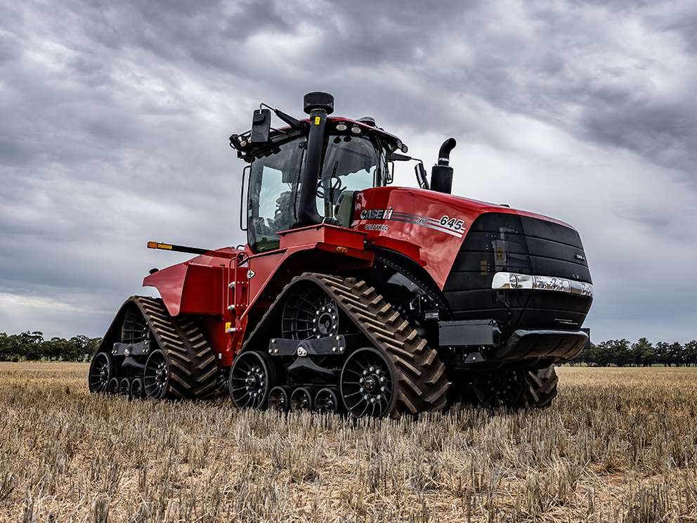 Red Case IH AFS Connect Magnum tractor working in field