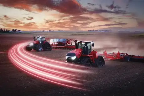 Case IH Steiger 645 tractor pulling a speed tiller 475 and Magnum 405 tractor pulling a 2160 early riser planter in a field.