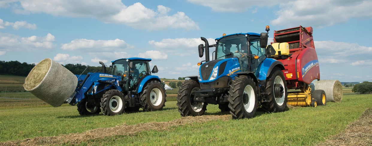 T5 tractors with implements in the field
