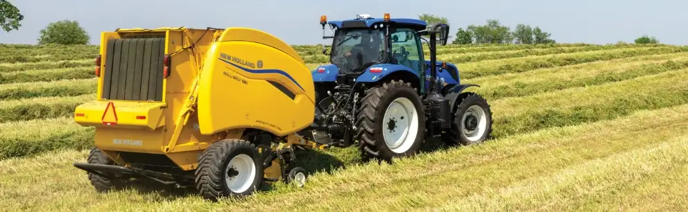 Roll Belt Round Baler in a field.