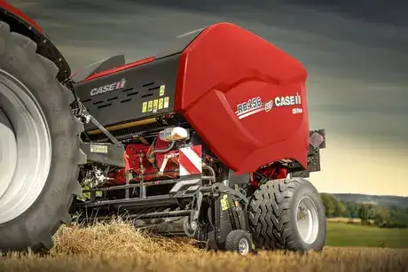 Round Balers RB 456466 HD PRO Series in field working with tractor