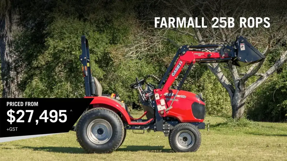 Red Case IH Farmall B tractor working in field 
