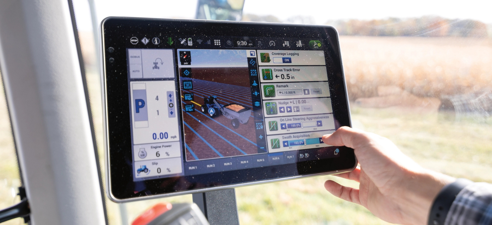 Operator tracks T9 tractor in the field using precision technology