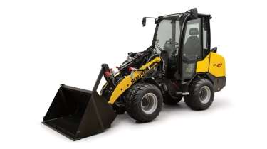 Small articulated loader from side.