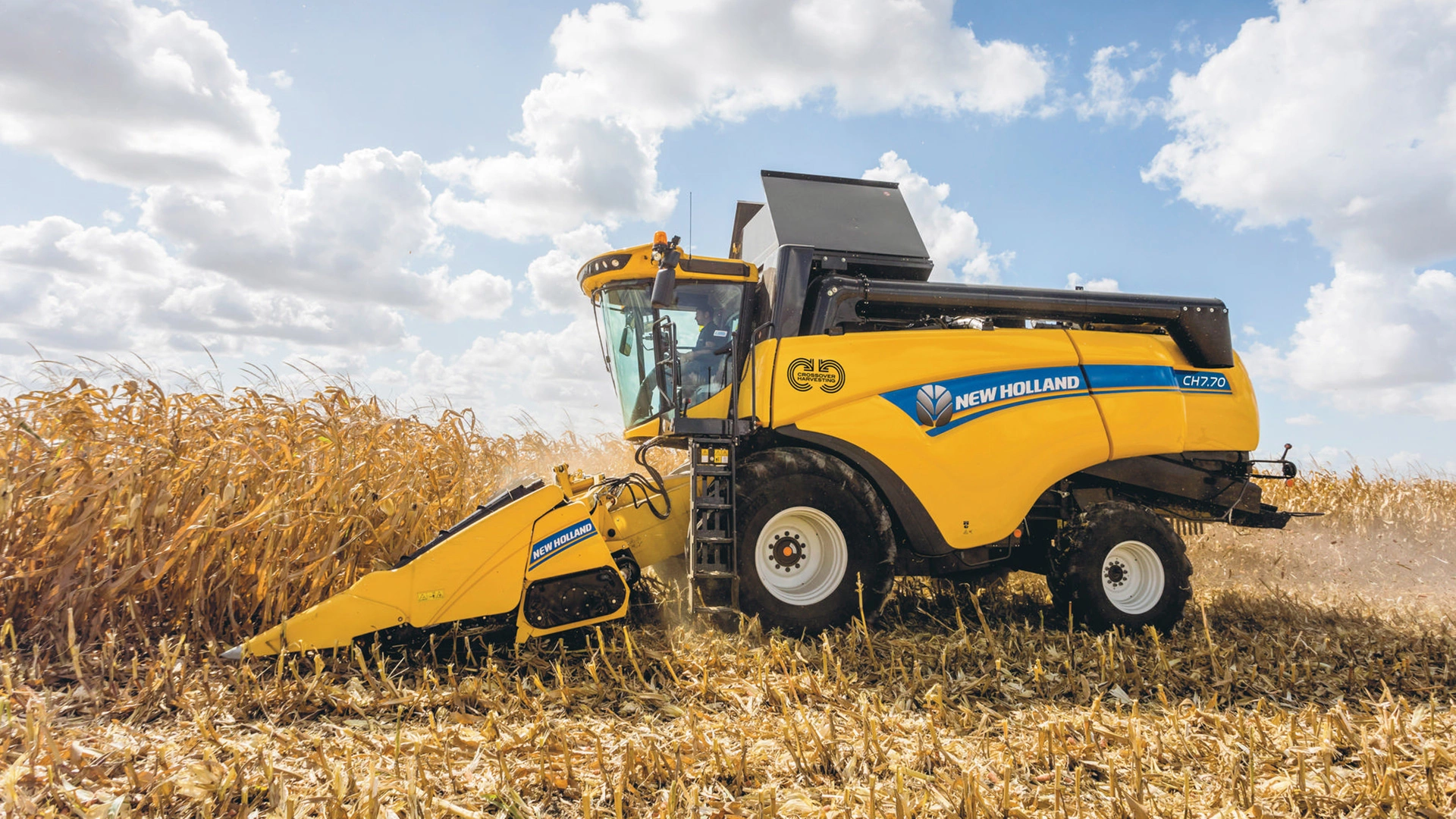 New Holland CH Combine Harvester in action, efficiently harvesting with agricultural combine header