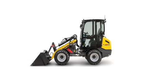 Side profile of small articulated loader.