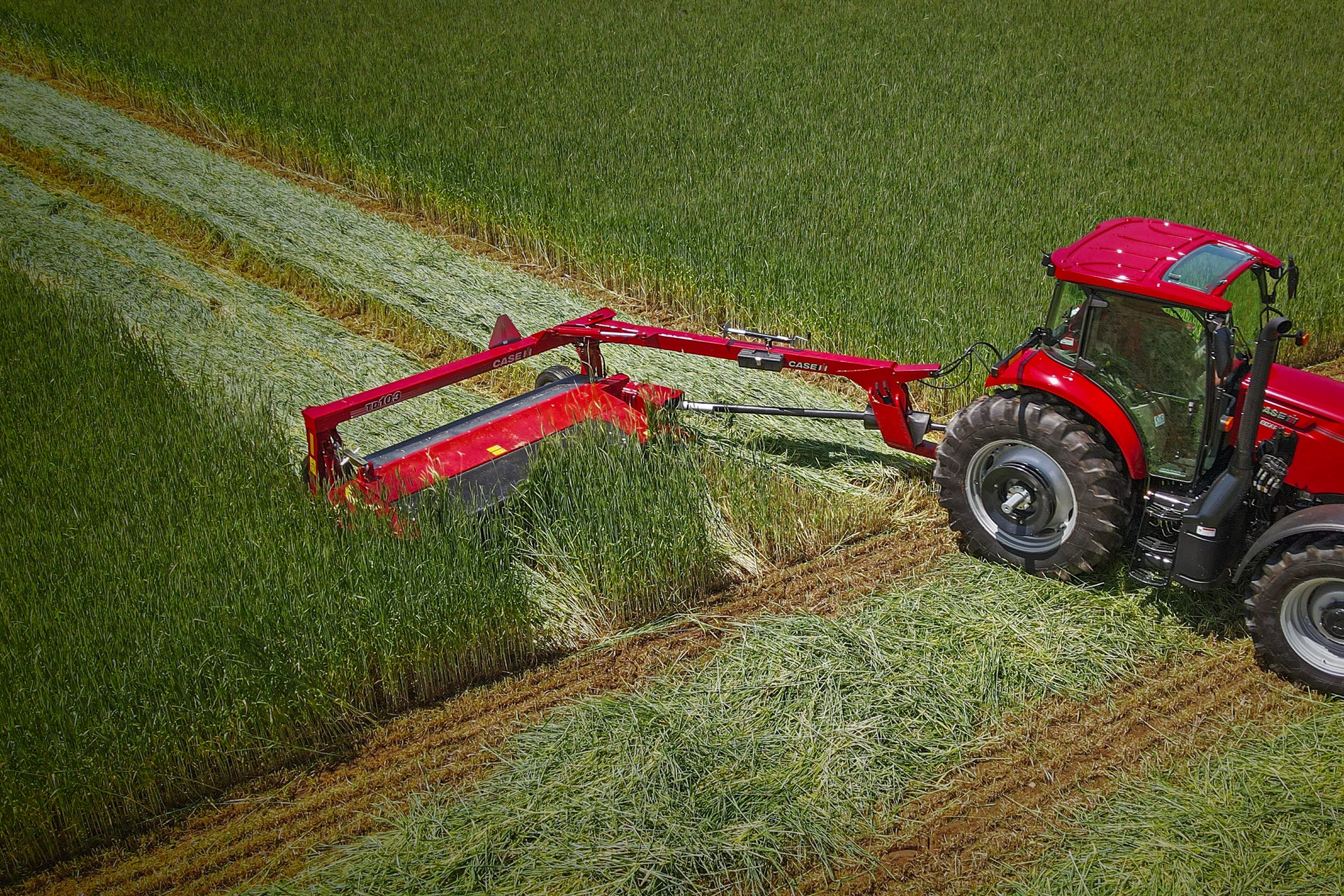 Case IH tractor and pull-type disc mower